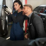 Car Repair Shop in Dallas service bay with technician inspecting vehicle engine at Kwik Kar Auto Dallas for diagnostics and maintenance